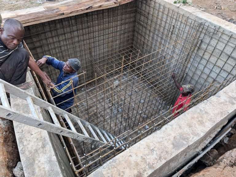 Building the reinforcement cage inside the excavated cradle in Abuja, Nigeria
